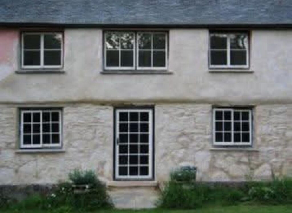 cob and granite building rendered and bagrubbed