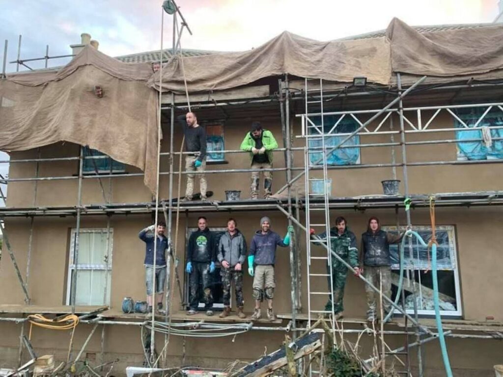 cornishlimebuilders rendering lime on a large project